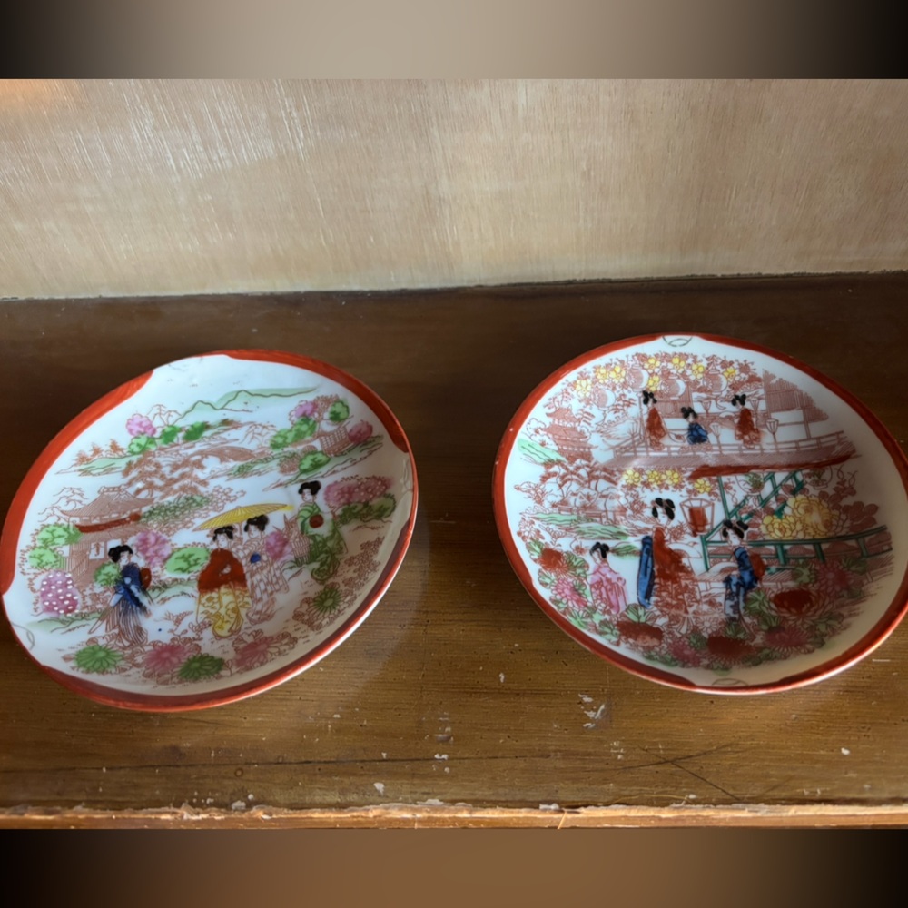 Decorative Asian-Inspired Plates with Red Accents